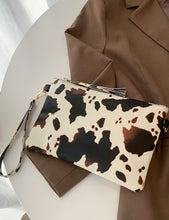 Load image into Gallery viewer, Cowprint Clutch with Tassel
